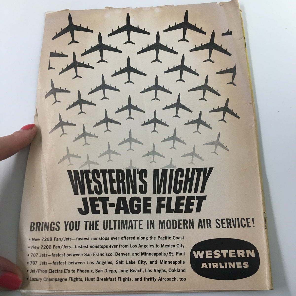 February 17 1962 NCAA Basketball SC vs UCLA Bruins The Hoop Official Program showing an advertisement for Western Airlines featuring airplanes in flight, highlighting modern air service.