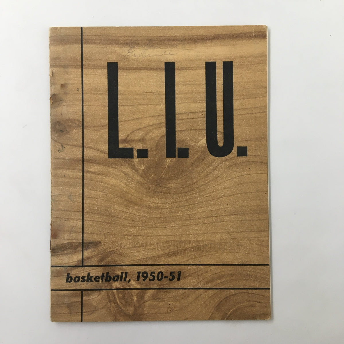 Cover of the 1950-1951 NCAA Basketball Long Island University Official Program featuring a wood texture design and bold letters L.I.U.
