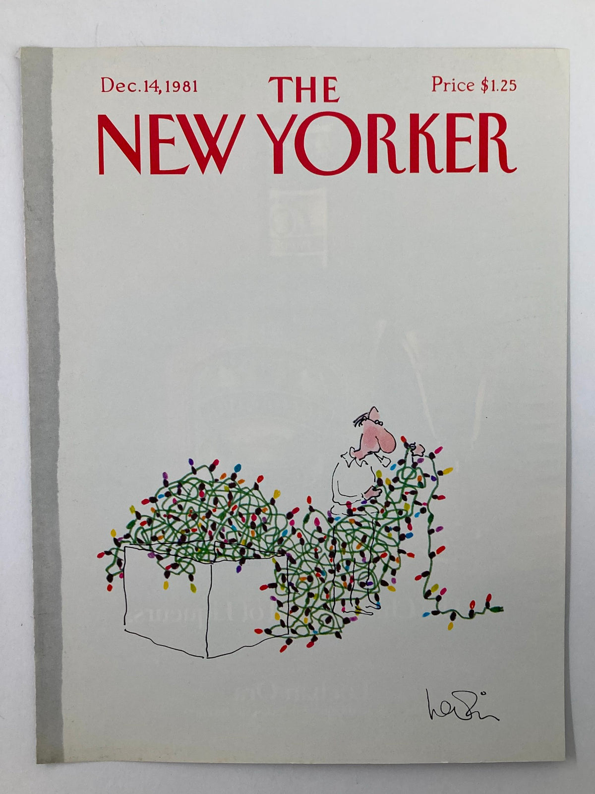 COVER ONLY The New Yorker December 14 1981, showcasing an amusing drawing of a man interacting with a mass of festive holiday lights, created by Heidi Goennel.
