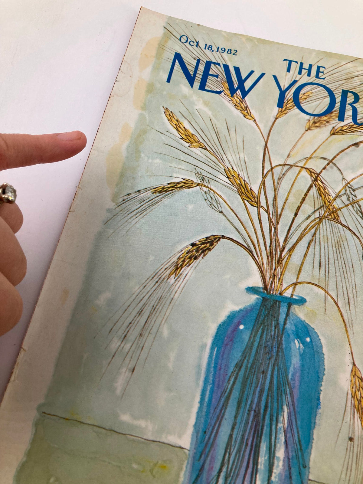 Cover of The New Yorker dated October 18, 1982 featuring a wheat vase illustration by Joseph Farris, showcasing artistic details and vintage charm.