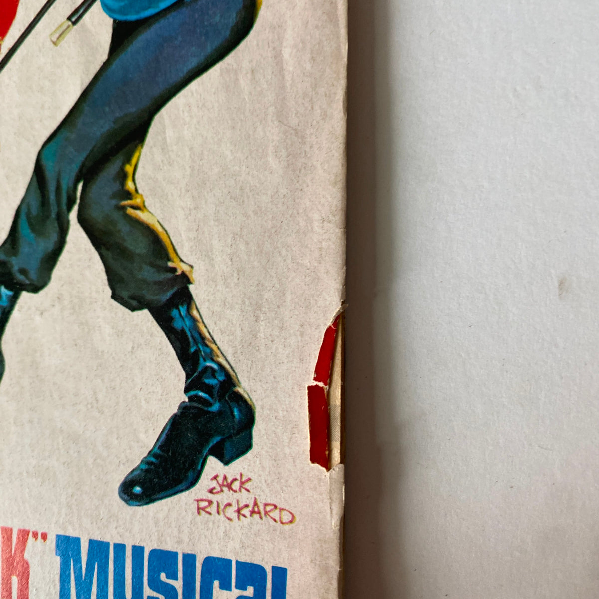 Close-up of the spine of Mad Magazine October 1976 No. 186 highlighting the illustration from the Star Trek musical parody, featuring character details and artist's signature Jack Rickard.