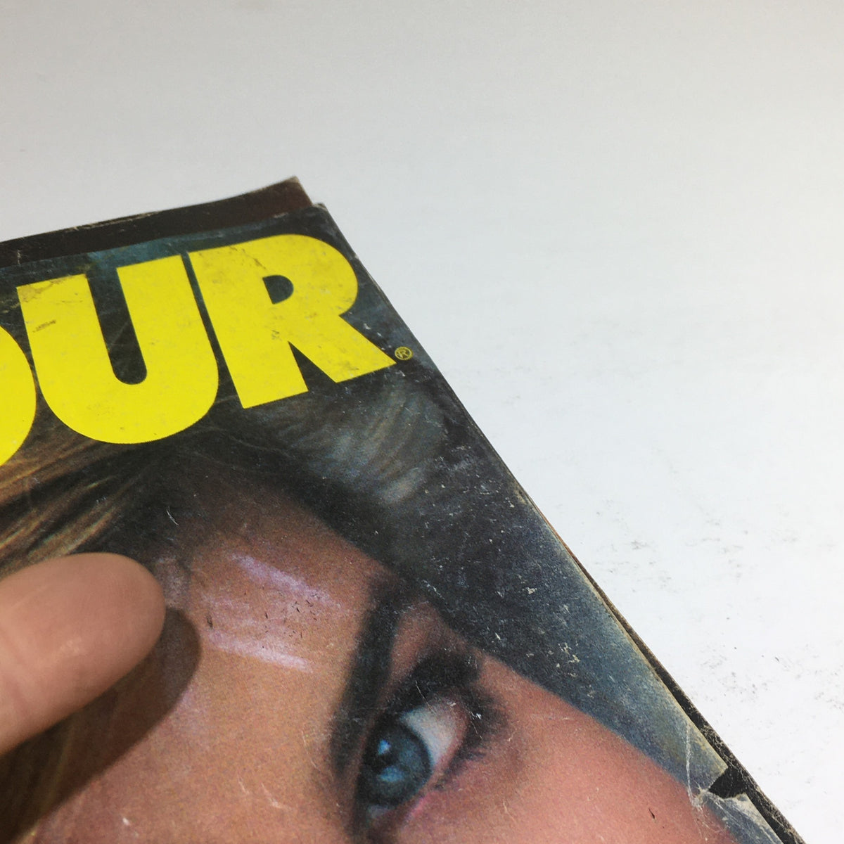 Close-up view of the cover of VTG Glamour Magazine: September 1982 featuring the prominent title and part of the model's face, showcasing the vintage aesthetic of the early 1980s.