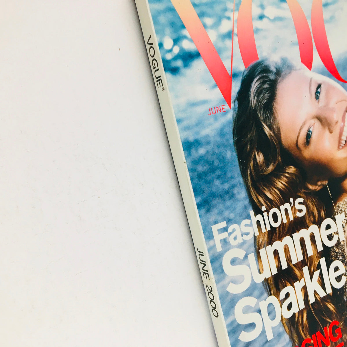 Close-up of Vogue Magazine June 2000 cover, highlighting the title and Gisele Bündchen's portrait, capturing the essence of the fashion trends of that era.