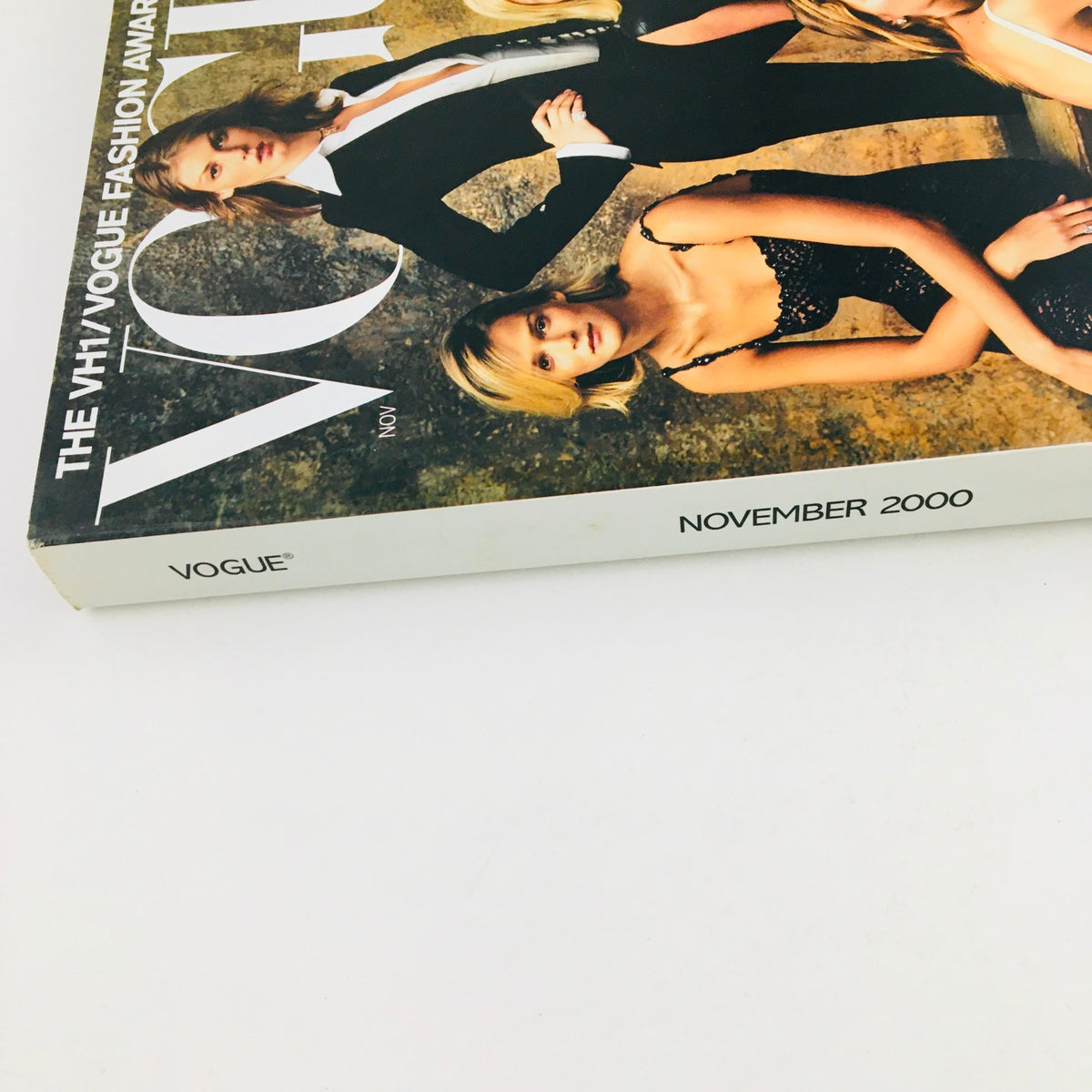 Spine view of Vogue Magazine November 2000, highlighting its title and publication date, representing a vintage fashion collectible with significance in fashion history.