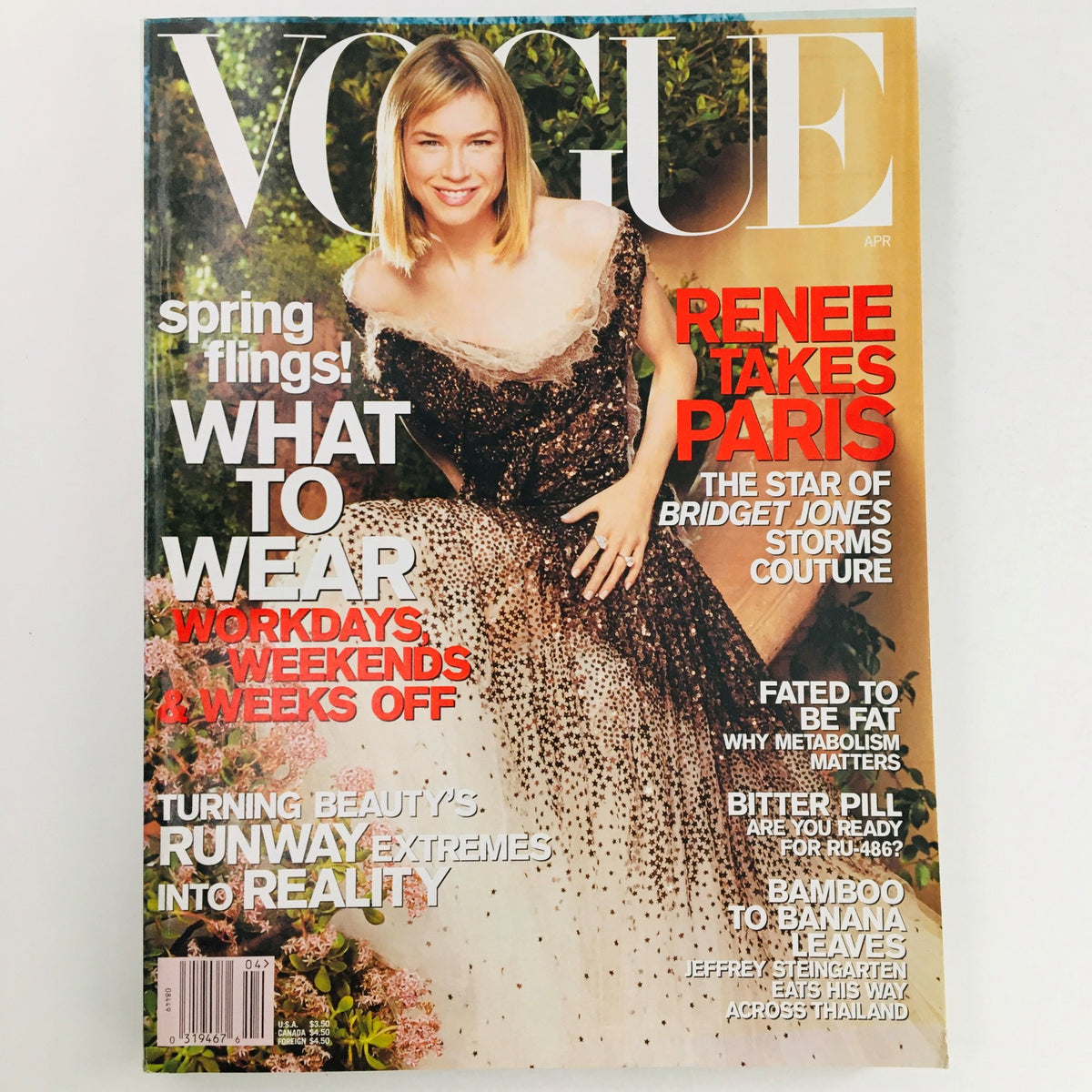 Vogue Magazine April 2001 cover featuring American actress Renée Zellweger, showcasing her in a stunning gown, with the headline 'Renee Takes Paris' and fashion insights for spring.
