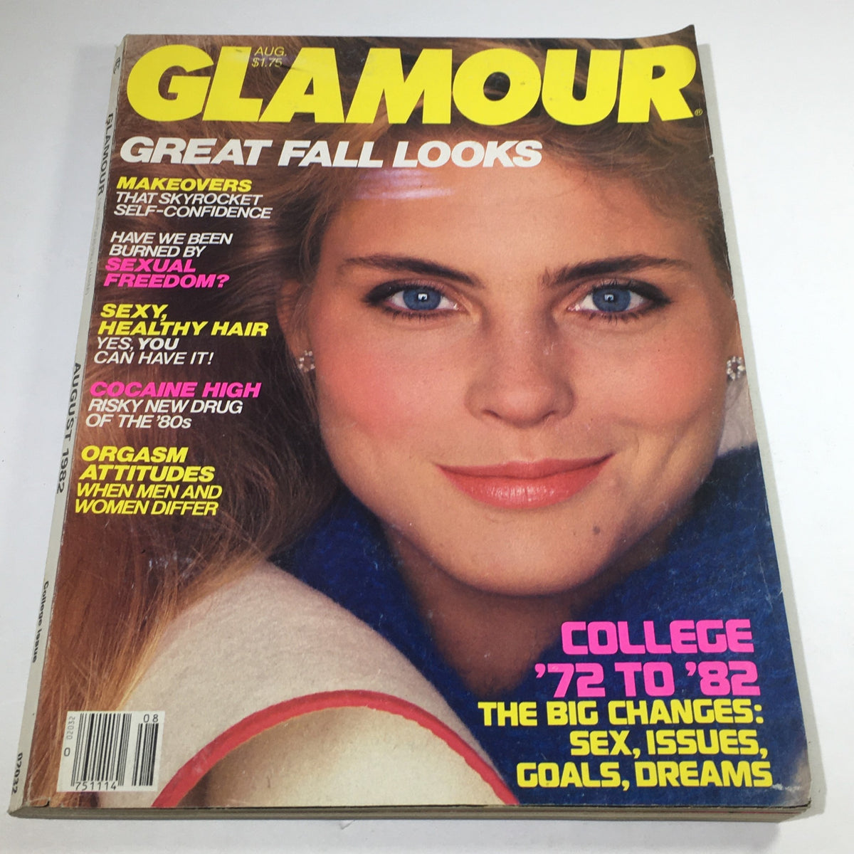 VTG Glamour Magazine: August 1982 featuring a cover with a woman displaying great fall looks, showcasing blue eyes and styled hair, with headlines on self-confidence, hairstyles, and societal topics.