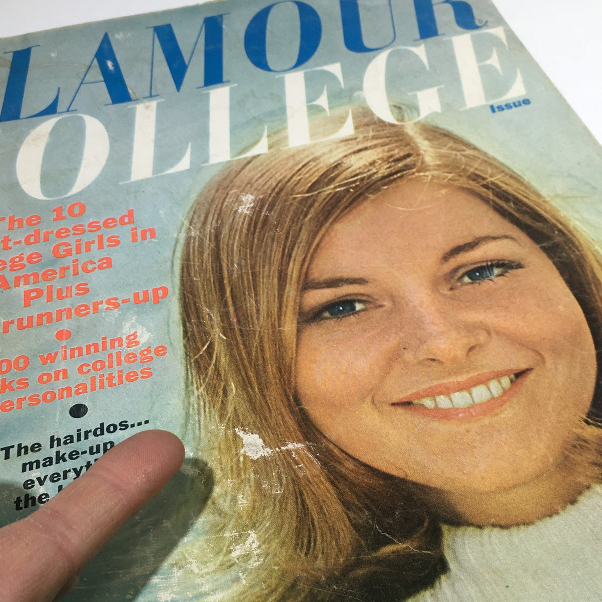 Close-up of the cover of VTG Glamour College Magazine from August 1965, showcasing a smiling young woman and the magazine's emphasis on college personalities.