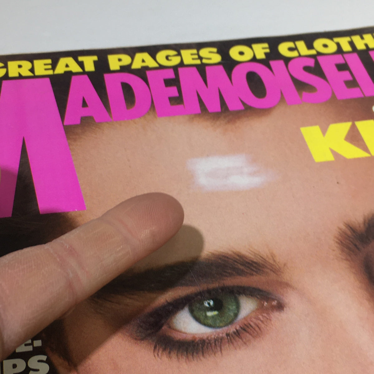 Close-up of the cover of Vintage Mademoiselle Magazine July 1983, highlighting Brooke Shields' features and details on the magazine such as the title and cover text.