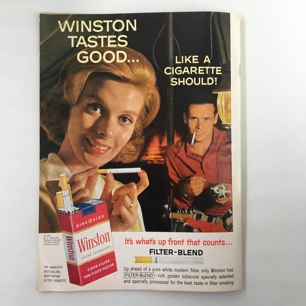 November 10 1962 NCAA Football Air Force vs UCLA Official Program advertisement for Winston cigarettes with a vintage design featuring a woman and a man.