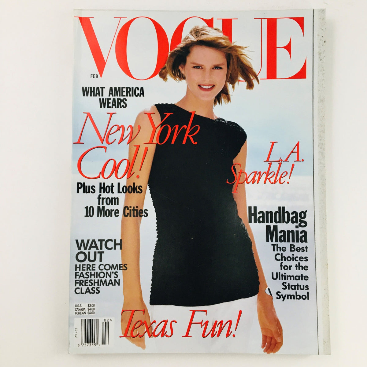 Vogue Magazine February 1998 featuring American model Carolyn Murphy on the cover, showcasing fashion themes like 'New York Cool' and 'L.A. Sparkle'. A must-have vintage item in very good condition.