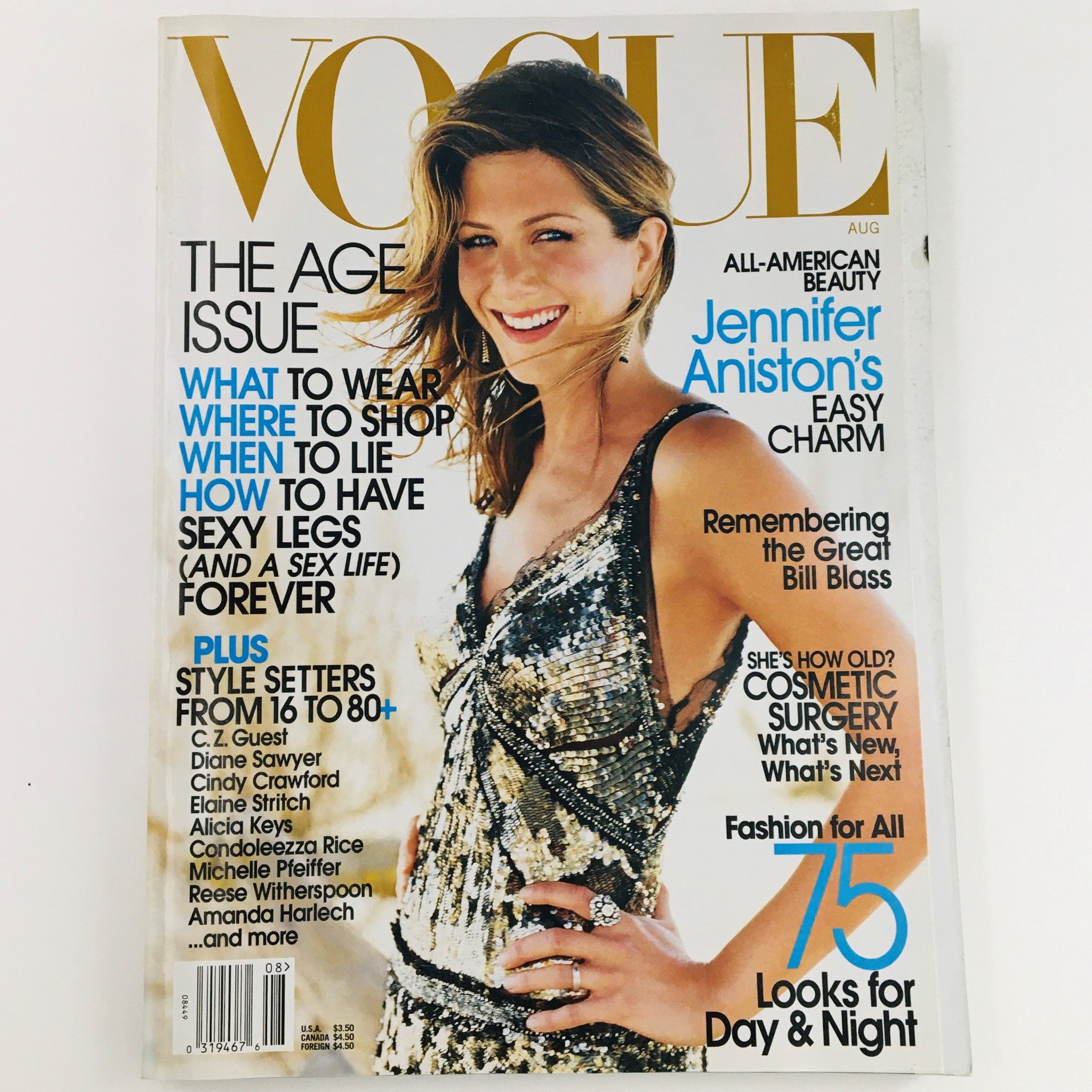 Grab the Vogue Aug 2002 with Aniston!