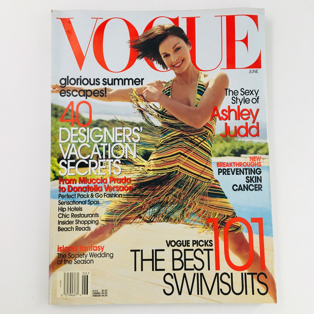 Vogue Magazine June 2002 cover featuring American actress Ashley Judd, highlighting summer fashion trends and swimsuit picks.