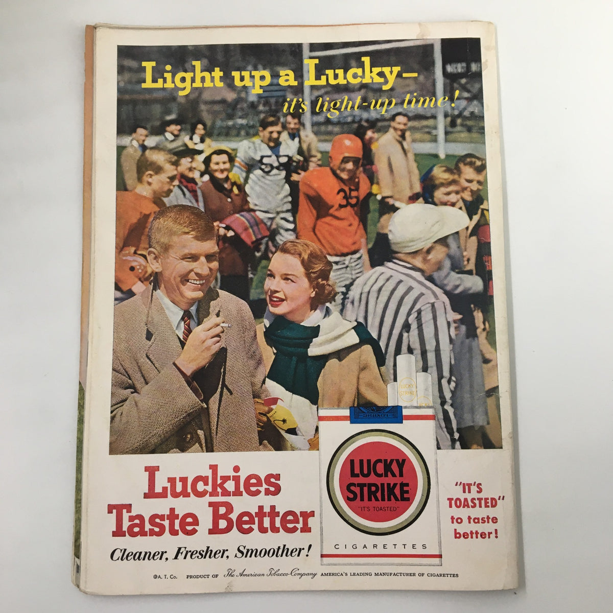 Vintage advertisement for Lucky Strike cigarettes featuring a football themed promotion from October 20 1956 NCAA Football UCLA vs California, capturing the era's marketing style.