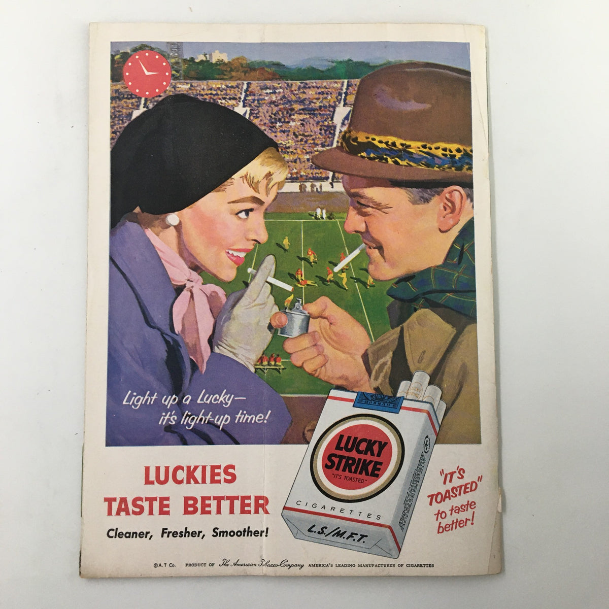 Vintage advertisement for Lucky Strike cigarettes from 1955, depicting a cheerful couple enjoying a football game. September 9, 1955 NCAA Football Iowa vs UCLA context.