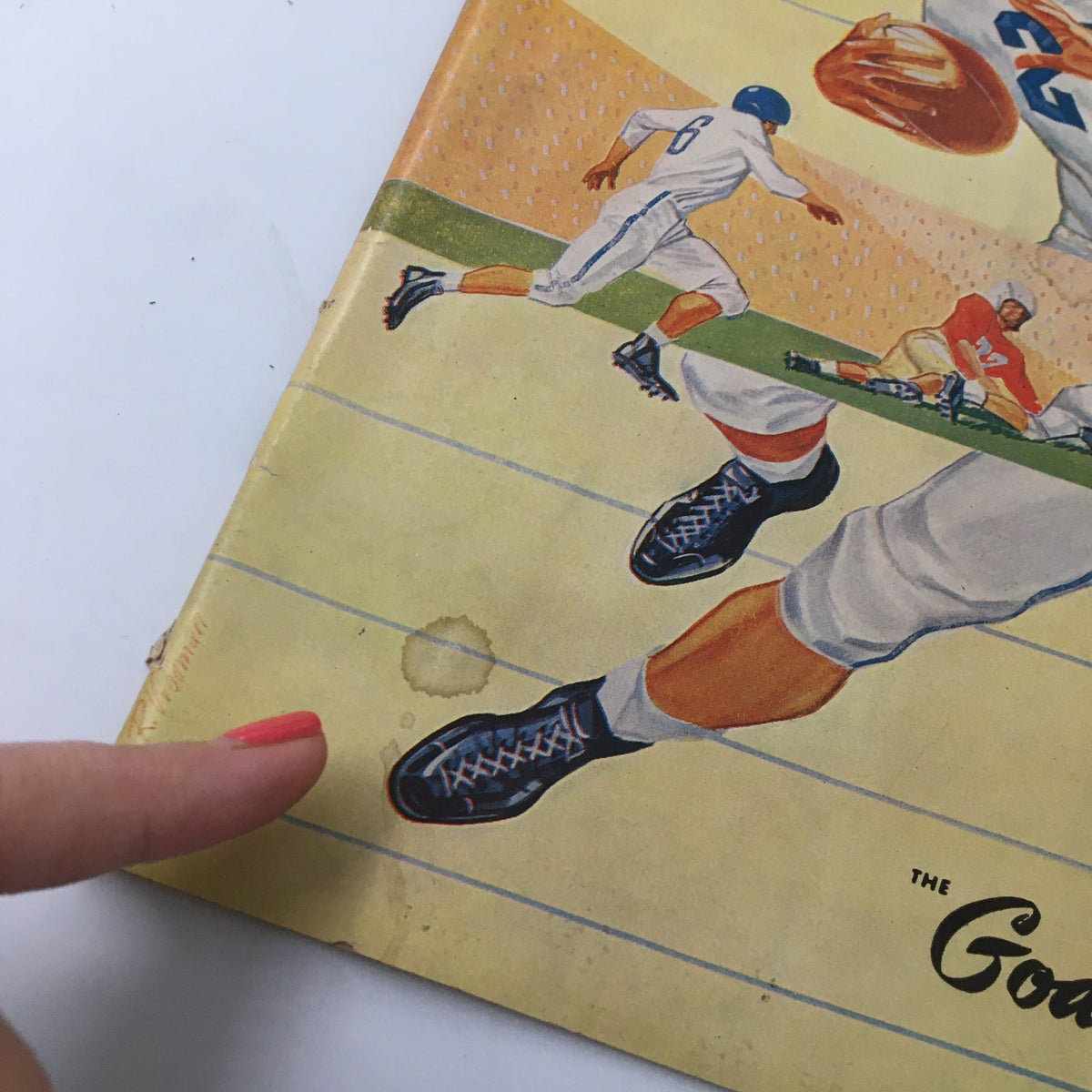 Close-up of The Goal Post collectible showing a player's foot in action, highlighting the detailing from the October 19, 1957 NCAA Football Oregon State Beavers vs UCLA Bruins matchup.