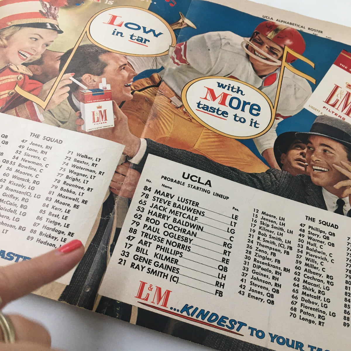 October 23 1959 NCAA Football UCLA Bruins vs Air Force Falcons booklet showcasing the UCLA starting lineup with illustrations representing the team's spirit and era.