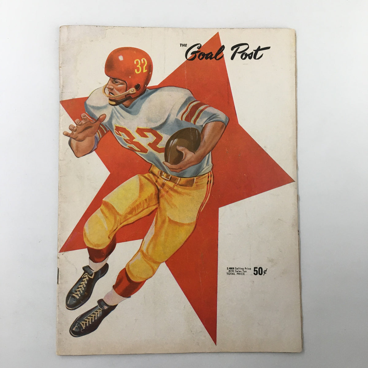 Cover of the booklet 'The Goal Post' featuring a football player in action, commemorating the November 19, 1960 NCAA Football game between USC Trojans and UCLA Bruins.