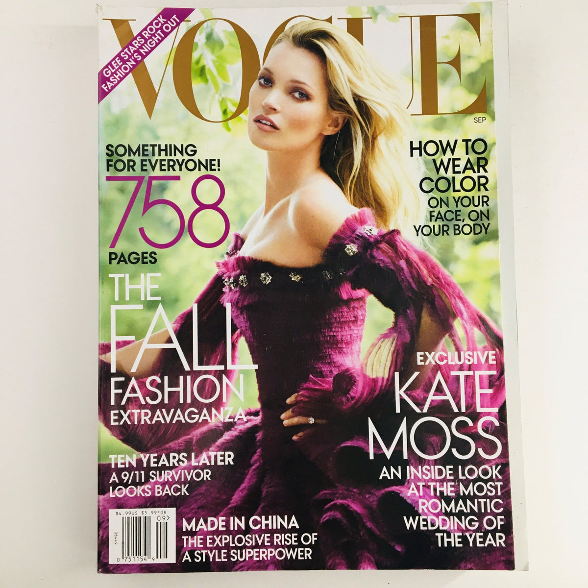 Vogue Magazine September 2011 featuring English supermodel Kate Moss on the cover, showcasing high fashion with a beautiful design, ideal for fashion enthusiasts and collectors.
