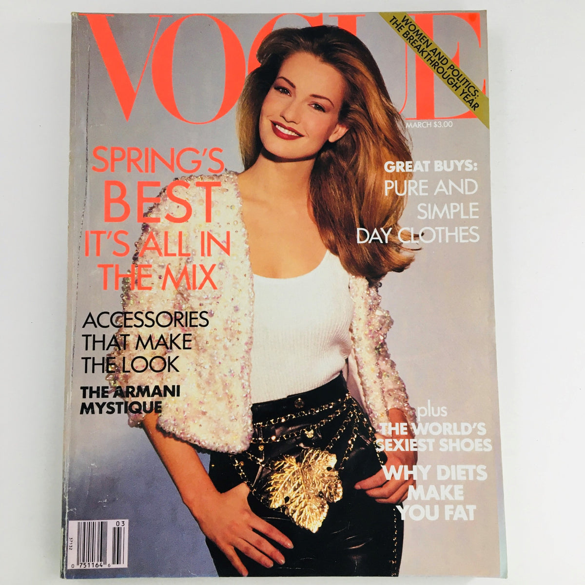 Vogue Magazine March 1992 featuring Dutch model Karen Mulder on the cover, showcasing spring fashion trends, including 'Spring's Best, It's All in the Mix.' The cover highlights chic accessories and features a stylish outfit, encapsulating the essence of 90s fashion.
