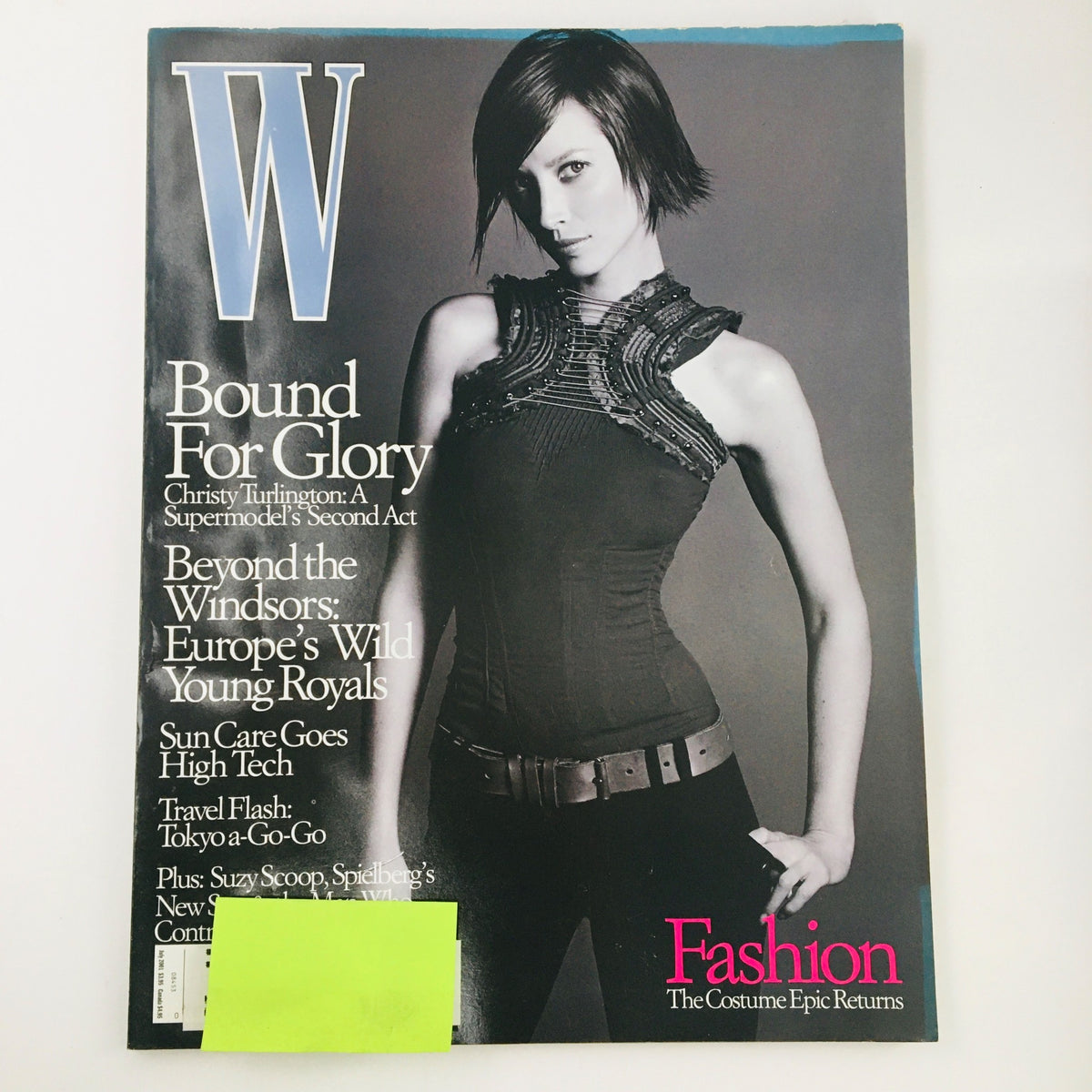 W Magazine July 2001 cover featuring supermodel Christy Turlington showcasing a bold fashion look, reflecting the glamour of early 2000s fashion culture.