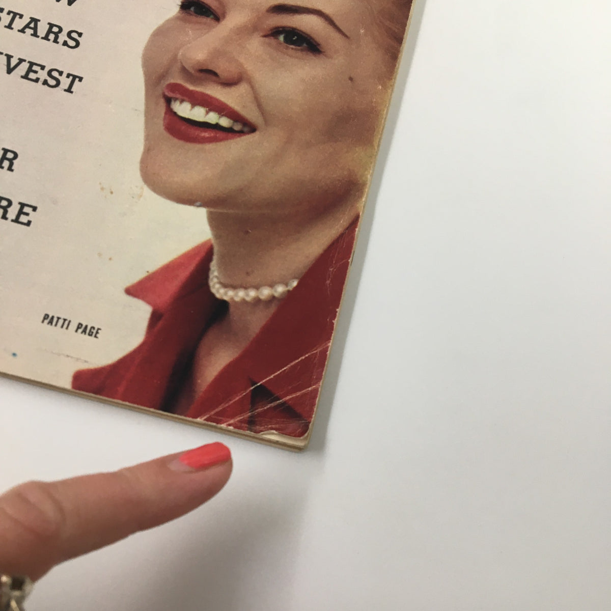 Close-up of the TV Guide Magazine from November 16, 1957, highlighting Patti Page's smiling face and the magazine's vintage cover details.