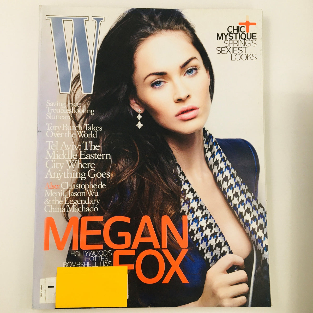 W Magazine March 2010 cover featuring Megan Fox, showcasing Hollywood's Hottest Bombshell with striking blue eyes and glamorous fashion.