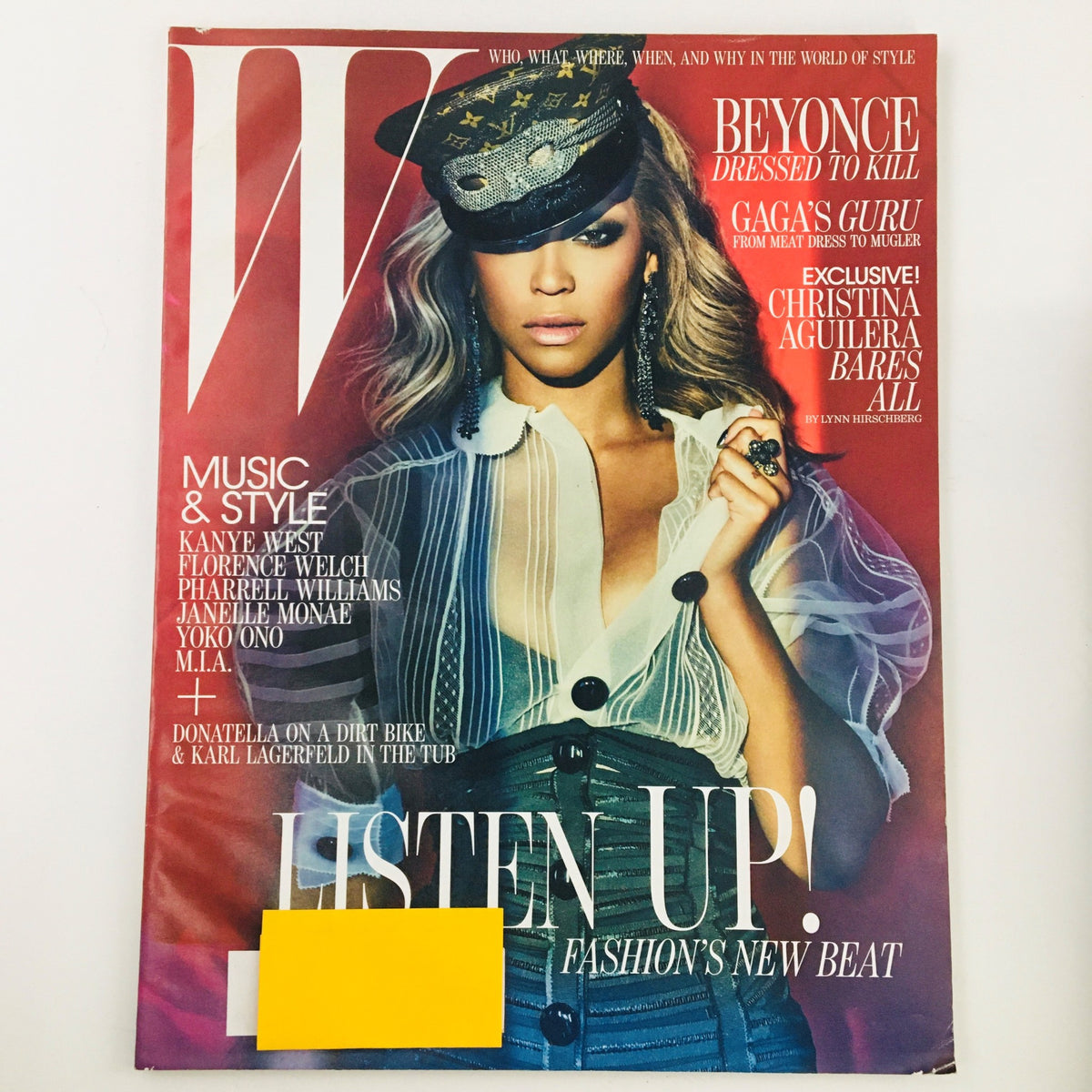 W Magazine July 2011 cover featuring singer-songwriter Beyoncé in a stylish outfit, promoting music and fashion. This issue is titled 'Dressed To Kill & Listen Up,' featuring various artists like Kanye West and Florence Welch, and highlights current music trends.