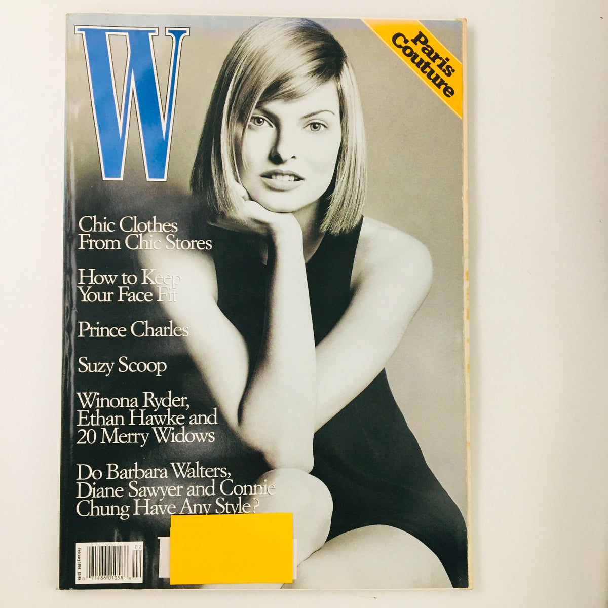 Cover of W Magazine February 1994 featuring Canadian model Linda Evangelista and Barbara Walters, highlighting fashion and journalism from the early 90s.
