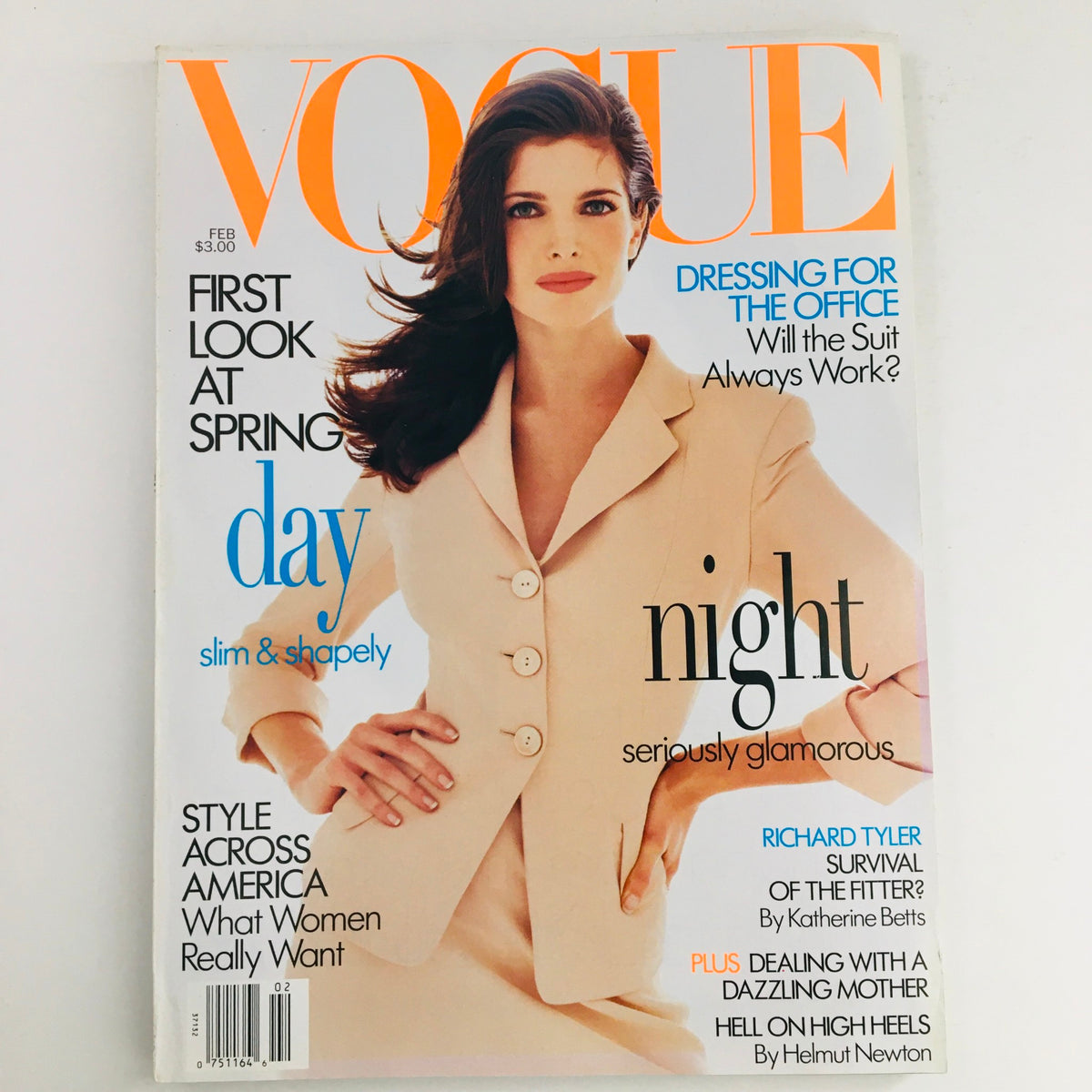 Vogue Magazine February 1995 featuring American model Stephanie Seymour on the cover, showcasing a stylish beige outfit with a highlight on spring fashion trends.