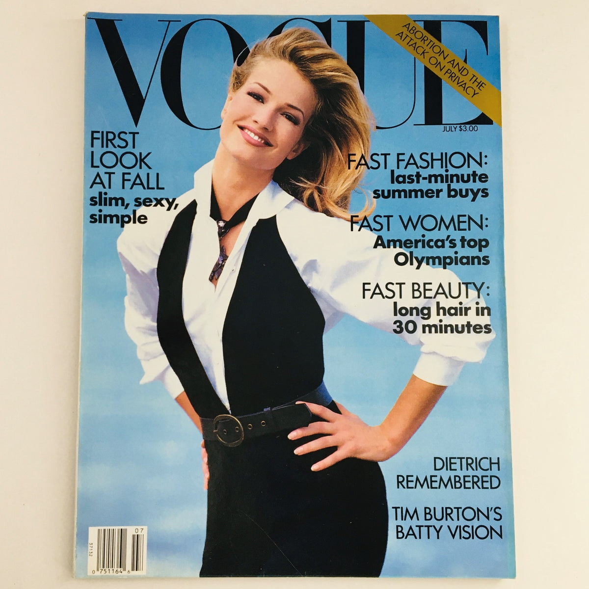 Cover of Vogue Magazine, July 1992 featuring Dutch model and singer Karen Mulder, showcasing a fashion editorial with highlights on summer fashion, women's trends, and beauty tips.