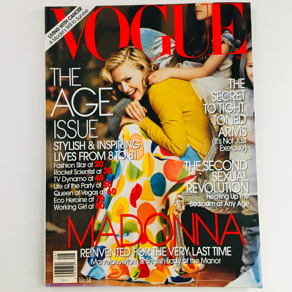 Vogue Magazine August 2005 featuring American singer-songwriter Madonna on the cover, showcasing vibrant fashion photography and articles with a nostalgic glimpse into mid-2000s pop culture.