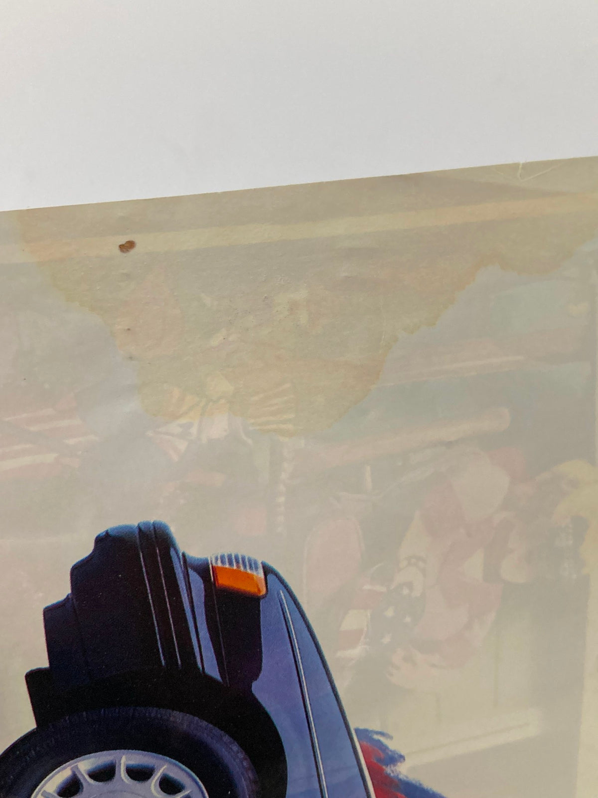 Damaged area on The New Yorker Cover July 5 1993, highlighting minor water damage but maintaining the vibrant essence of Red Grooms' Independence Day illustration.