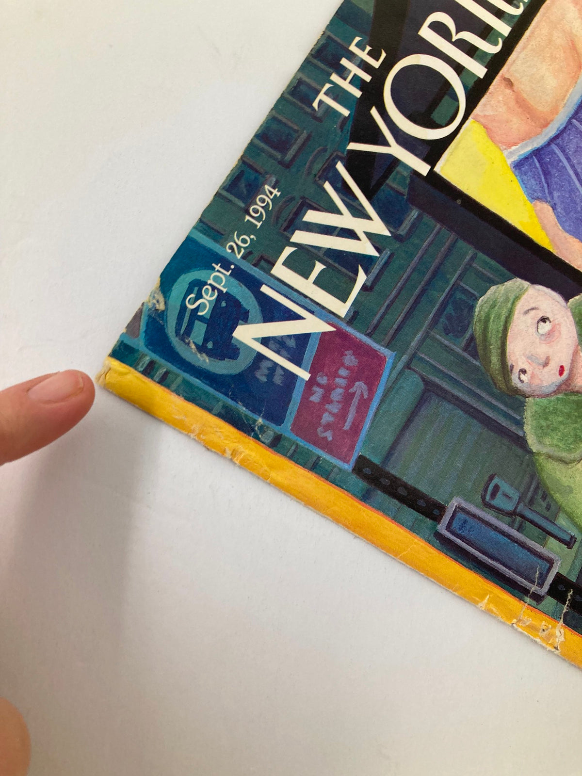 Close-up of The New Yorker cover from September 26, 1994 titled 'Brief Encounter' by Art Spiegelman, highlighting the worn edge and date on the magazine.