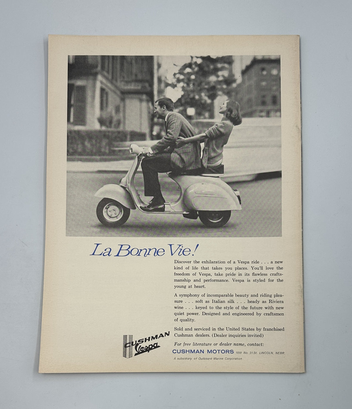 Ad page from Cycle Magazine July 1961 showcasing a Cushman scooter with the slogan 'La Bonne Vie!', highlighting scooter riding culture and lifestyle.