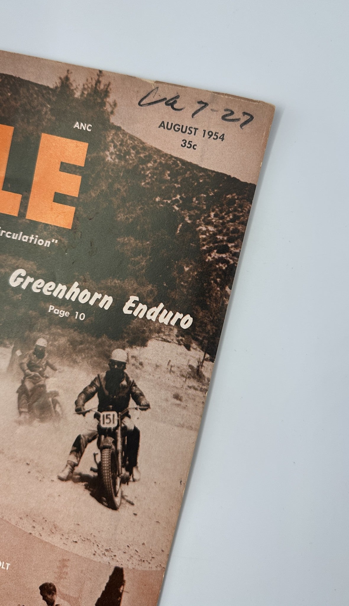 Close-up of the Cycle Magazine August 1954 cover, highlighting the Greenhorn Enduro event and featuring handwritten date 'Aug 7-27'.