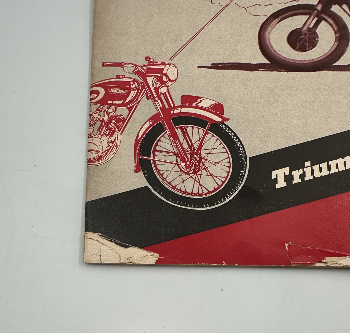 Close-up of Cycle Magazine June 1954 cover showing a vintage motorcycle and titled 'Triumph Terrier Test' with visible wear.