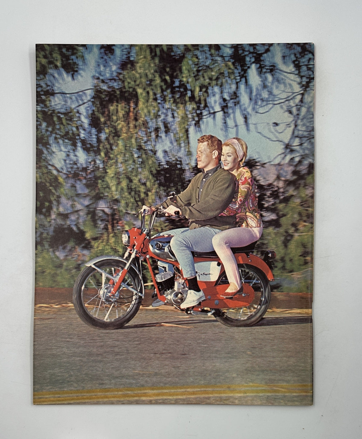 Cycle Magazine January 1964 featuring a vintage photo of a couple riding a Yamaha motorcycle, showcasing a playful and adventurous spirit, ideal for motorcycle enthusiasts and collectors.