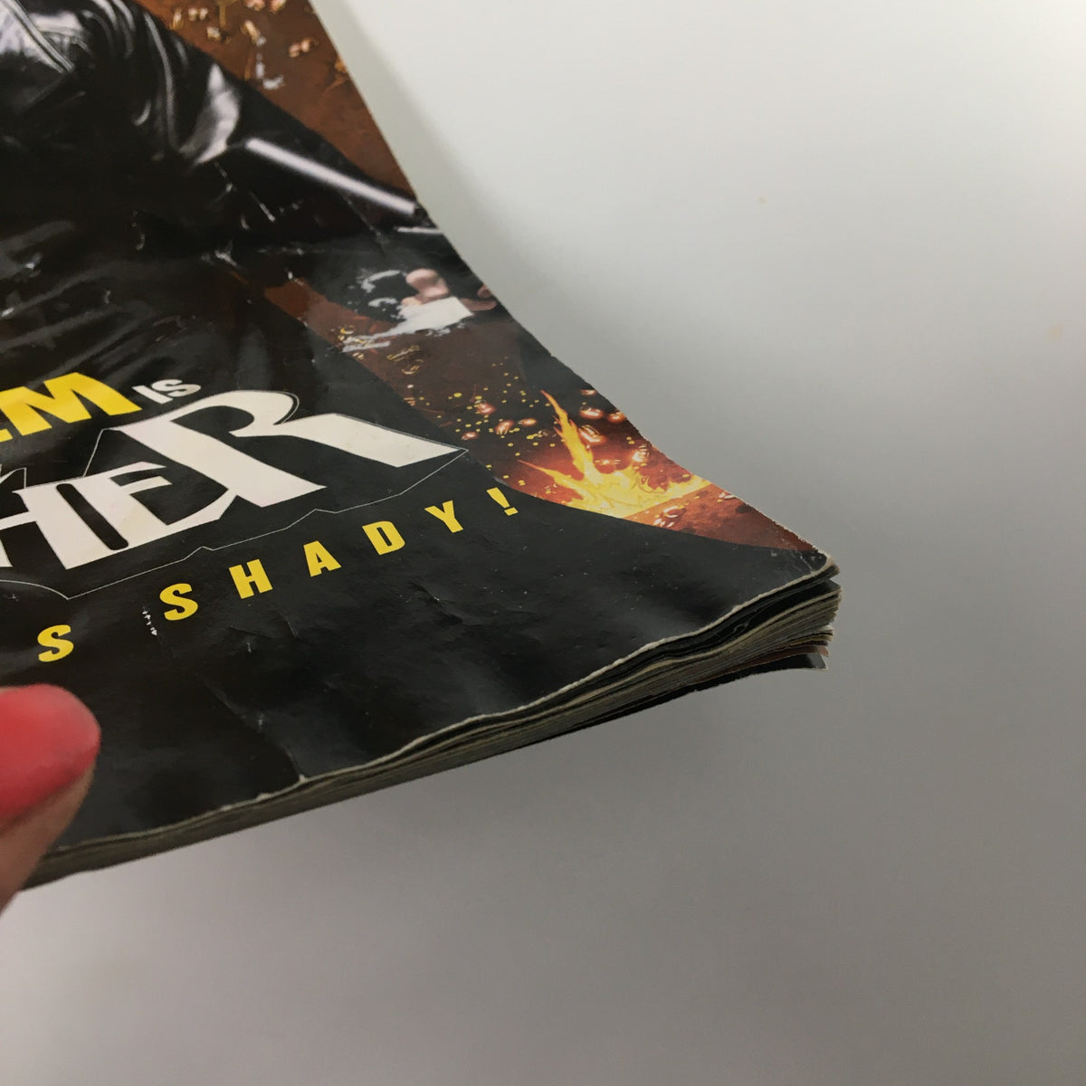Close-up of the edge of XXL Magazine June 2009 featuring Eminem and The Punisher, showing wear typical for its age.