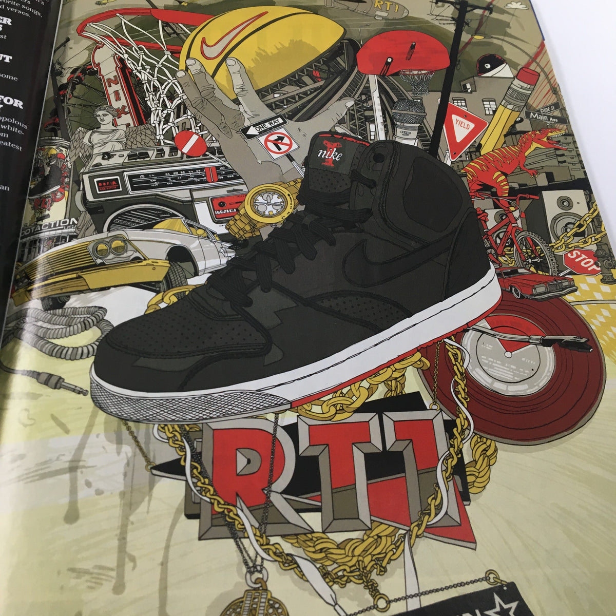 Artistic spread from XXL Magazine June 2009 showcasing a black Nike sneaker surrounded by pop culture elements, relating to the 'Vengeance is Eminem and The Punisher' theme.