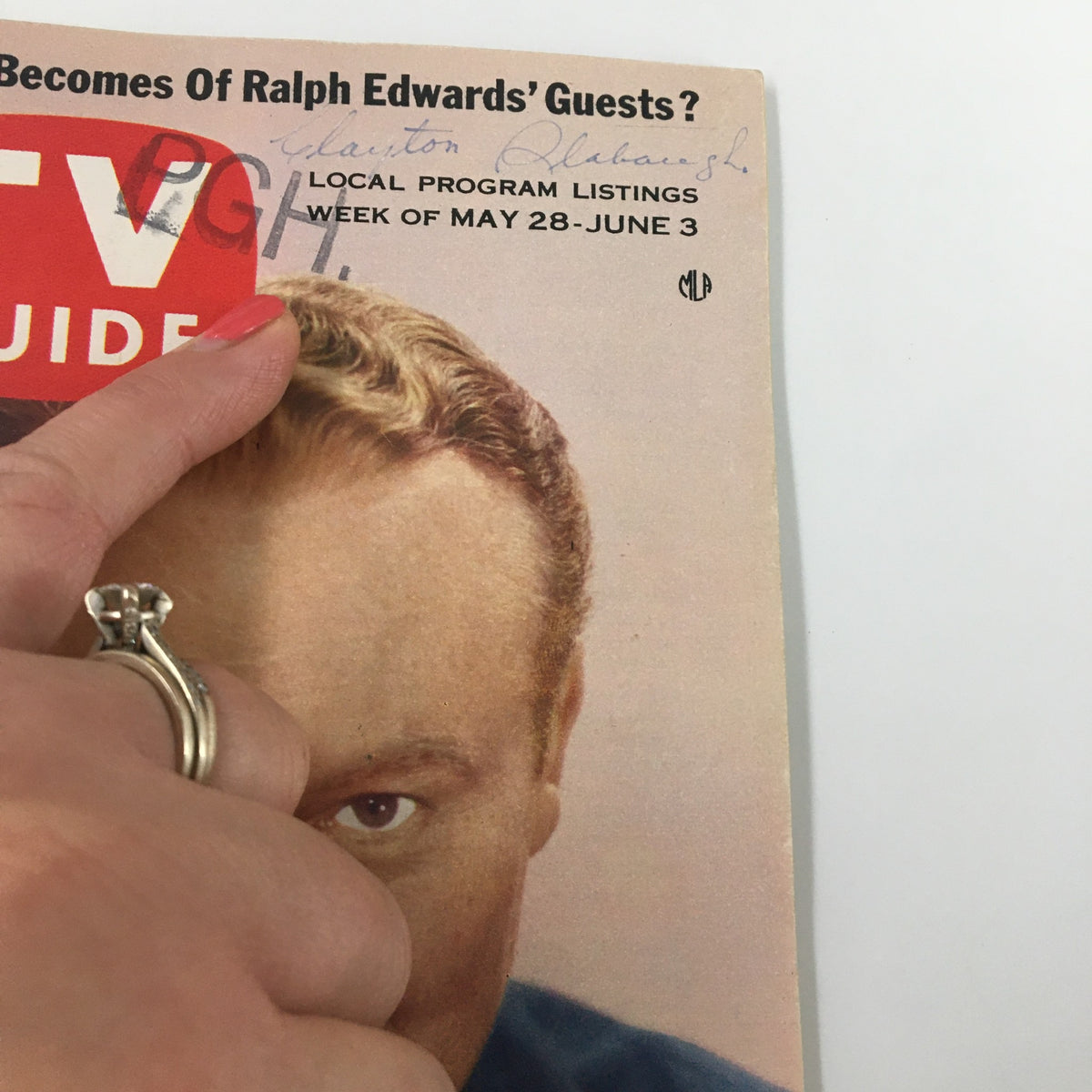 Detailed view of the cover of TV Guide Magazine May 28, 1955, with Ralph Edwards, showing handwritten notes and program listings.