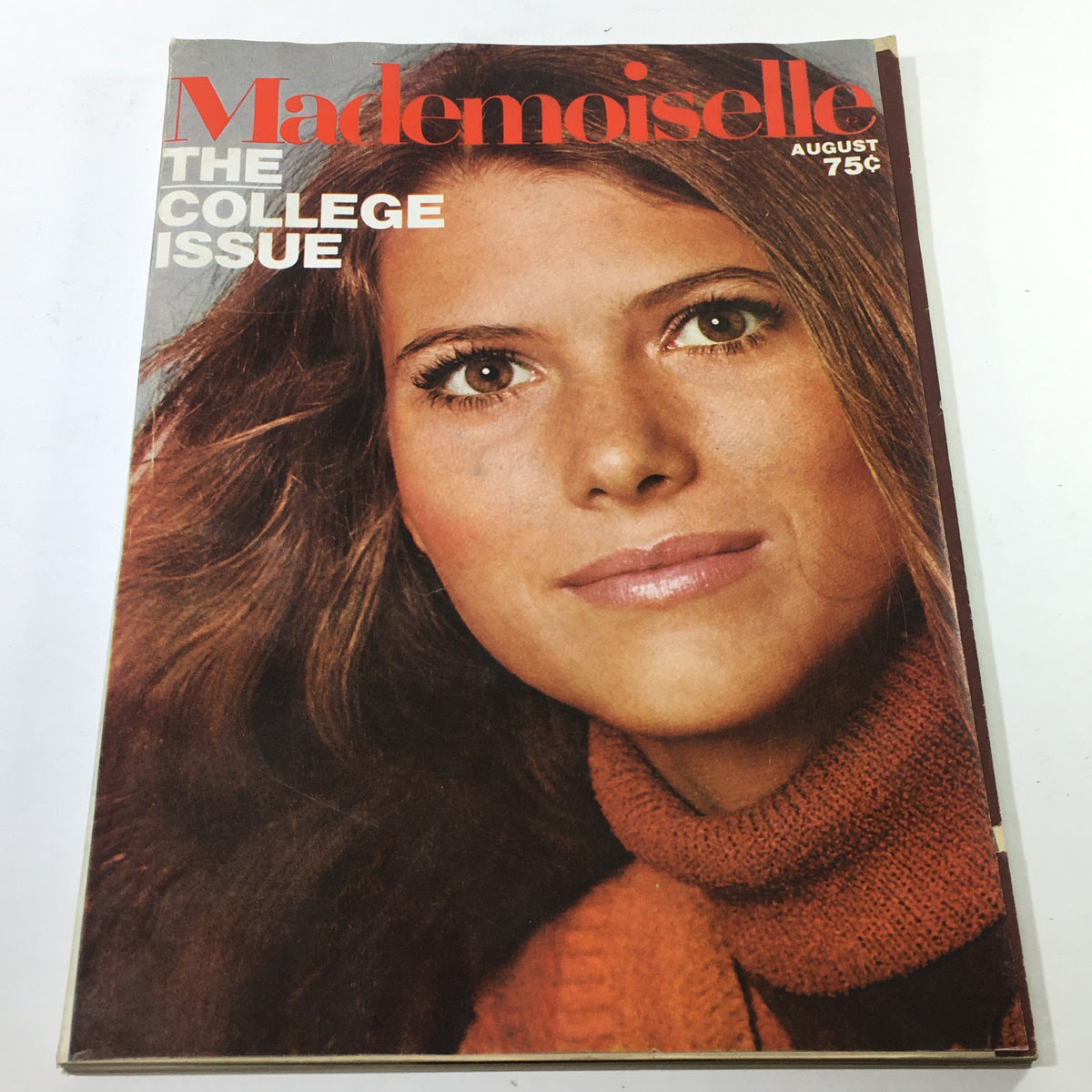 Cover of VTG Mademoiselle The College Issue: August 1970 featuring a young woman with wavy hair, wearing an orange turtleneck sweater, smiling at the camera. The magazine is priced at 75 cents and highlights 'The College Issue'.