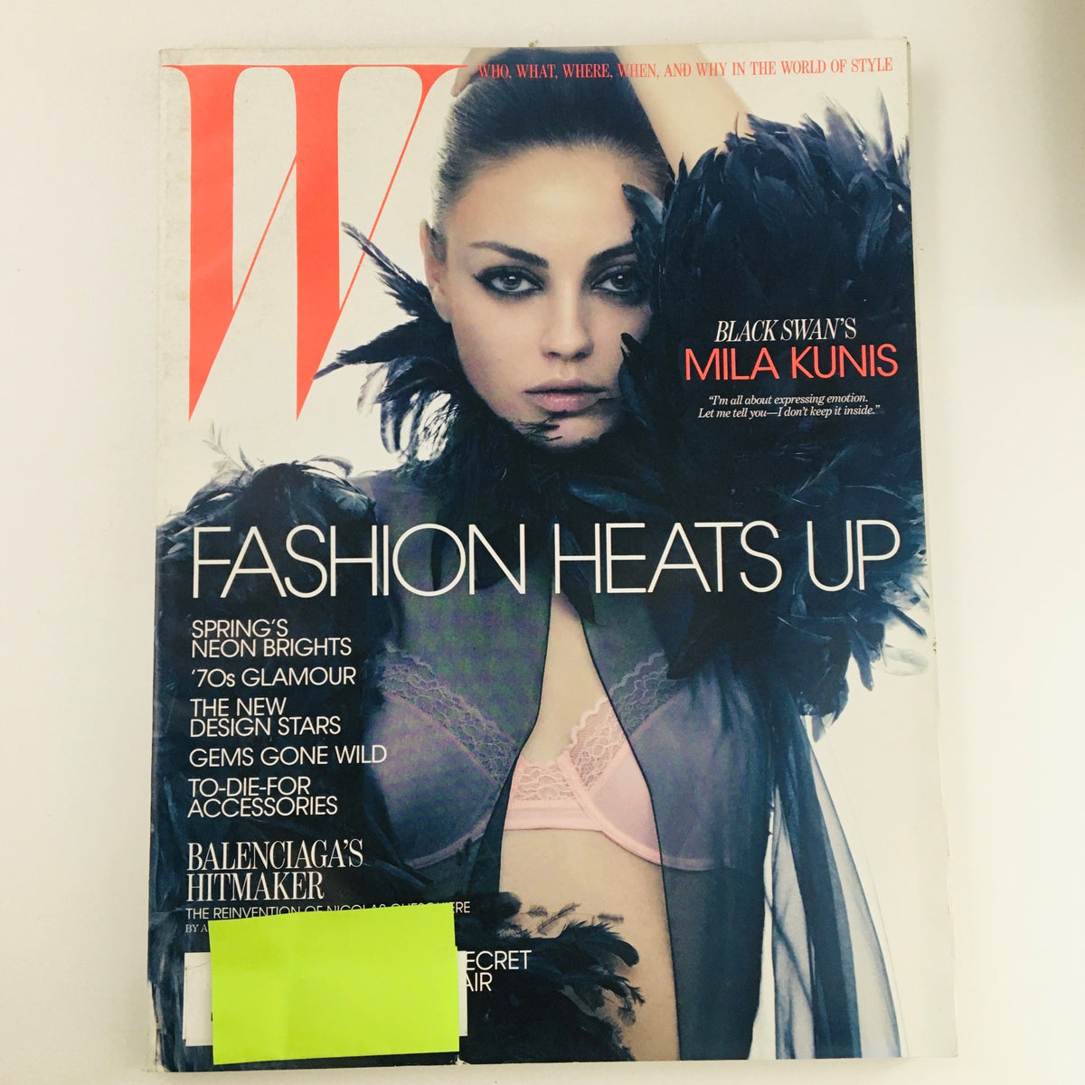 W Magazine March 2011 cover featuring American actress Mila Kunis, showcasing the headline 'Fashion Heats Up' along with a dramatic fashion editorial style, representing contemporary trends and the influence of celebrity culture in high fashion.