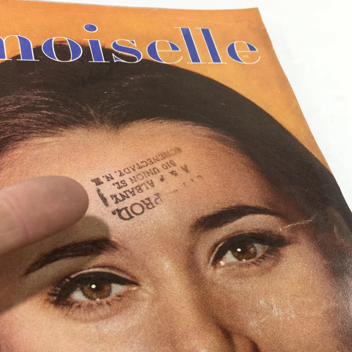 Close-up of Vintage Mademoiselle Magazine Cover, January 1966, showing details of Maren Gustafson's face and magazine stamp.