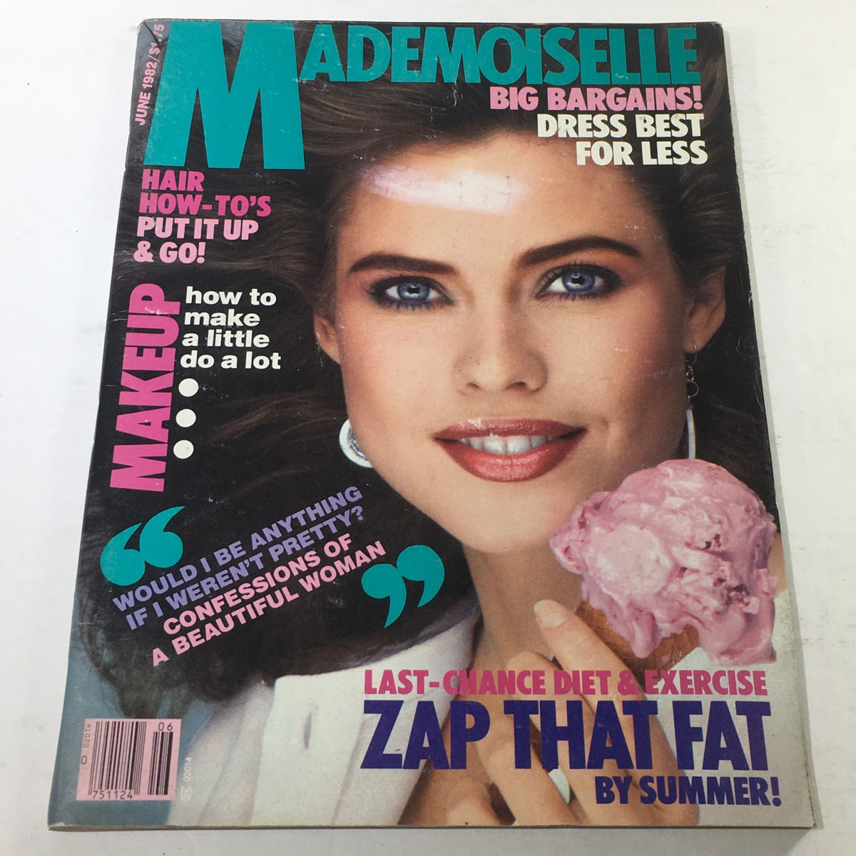 Cover of VTG Mademoiselle Magazine: June 1982 featuring a model with blue eyes and a joyful expression holding an ice cream cone. The magazine promises tips on hair, makeup, and fashion, with bold headlines advertising beauty secrets and summer diet advice.