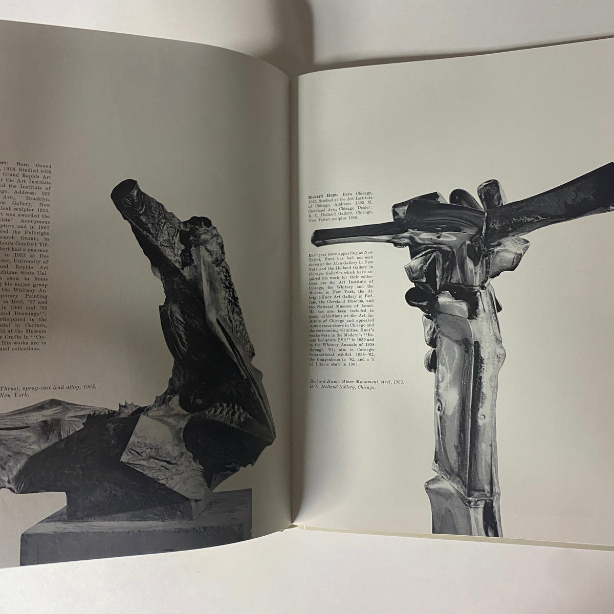 Inside spread of Art in America Magazine No. 4 1964 showcasing two sculptures and an accompanying text describing each artwork.