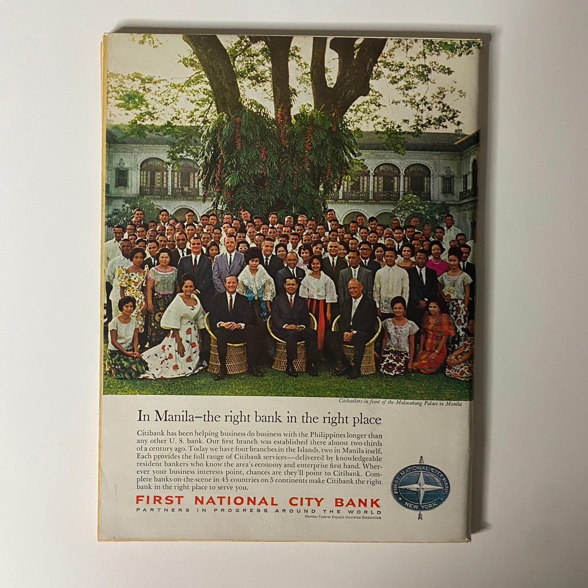 Businessweek Magazine May 21, 1966 cover featuring John W. Gardner, showcasing a large group of individuals in traditional attire gathered outdoors in front of a historic building, promoting Citibank's services in the Philippines.