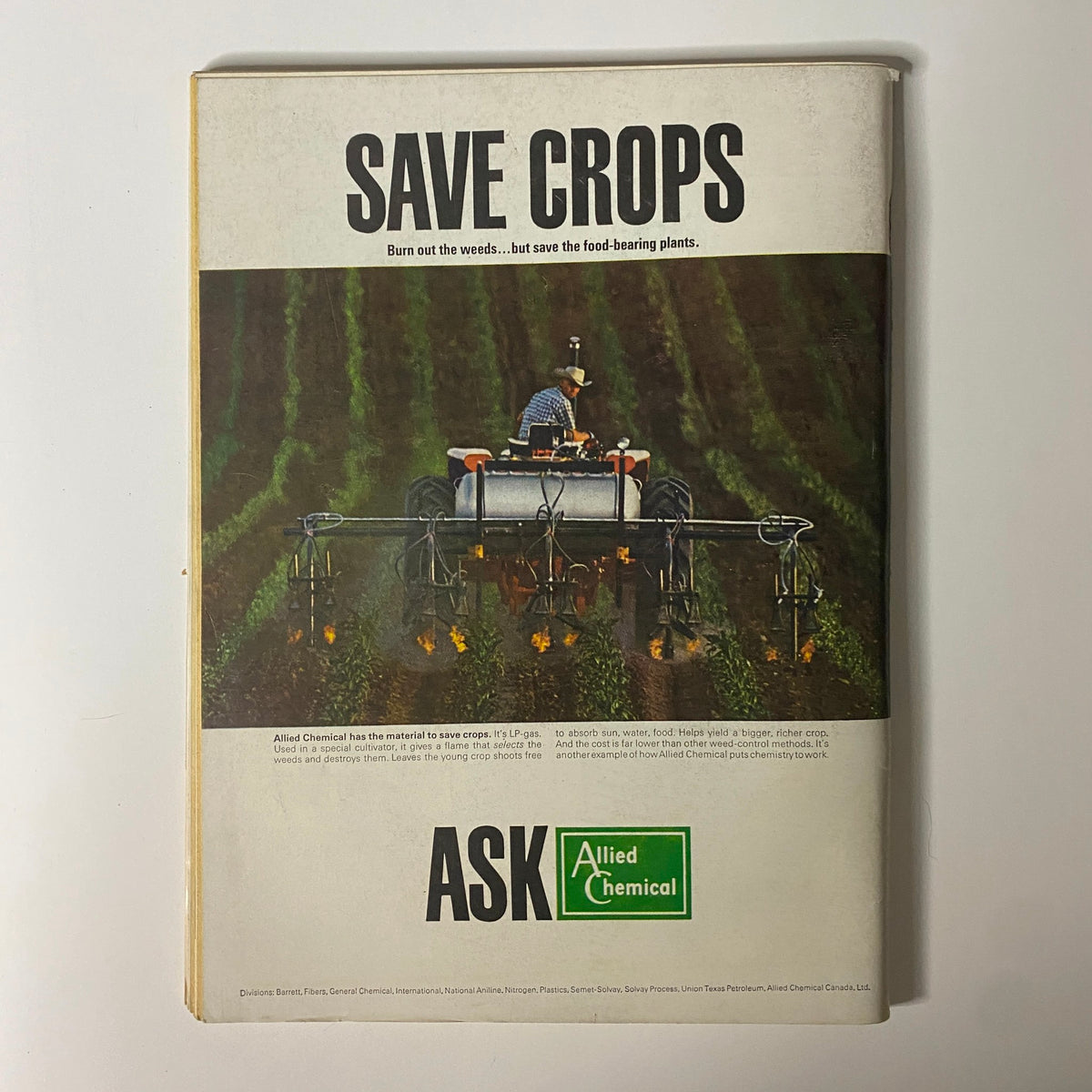 Advertisement from Businessweek Magazine April 16, 1966 promoting Allied Chemical's crop-saving products, featuring a farmer using a spraying machine.