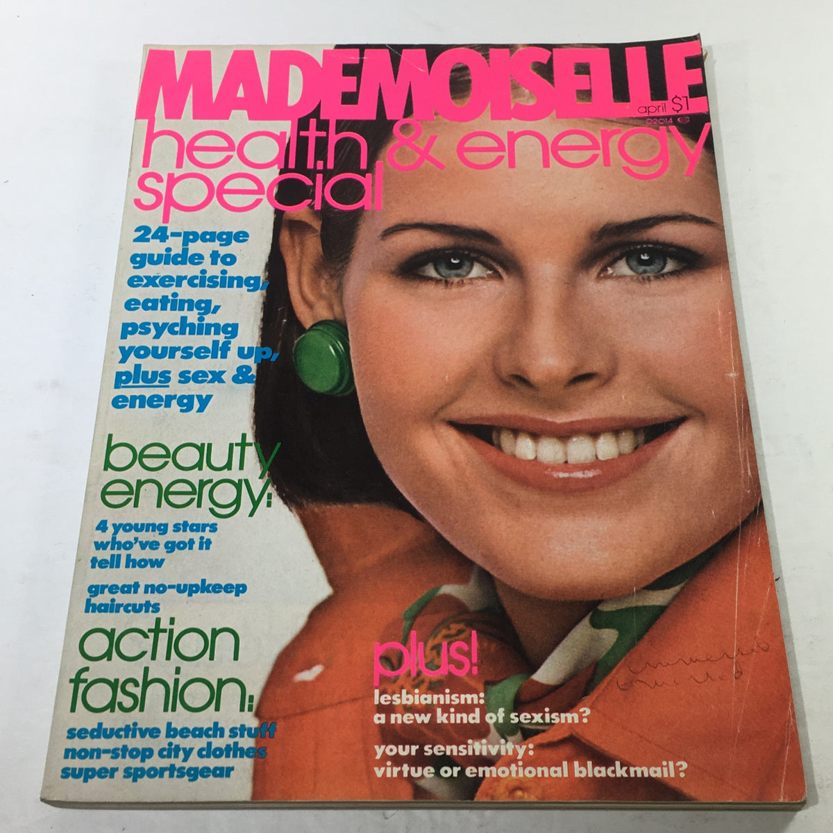 VTG Mademoiselle Magazine April 1976 cover featuring a smiling model with bold fashion, showcasing the essence of 1970s style.