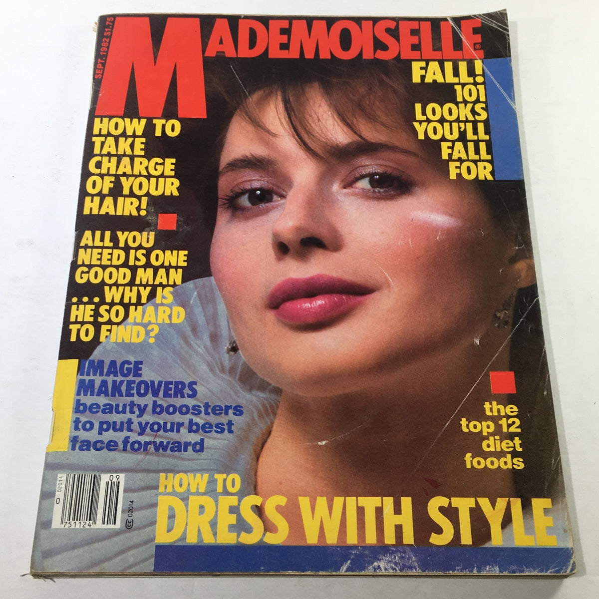 Mademoiselle Magazine: September 1982 cover featuring a model with striking makeup, highlighting fashion styles and trends from the 1980s.