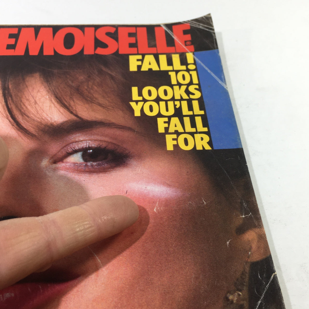 Close-up view of Mademoiselle Magazine: September 1982 cover, showcasing model's eye and makeup details with bold text about fall fashion.